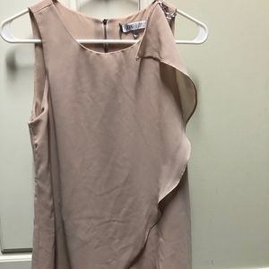 Jennifer Lopez light pink blouse